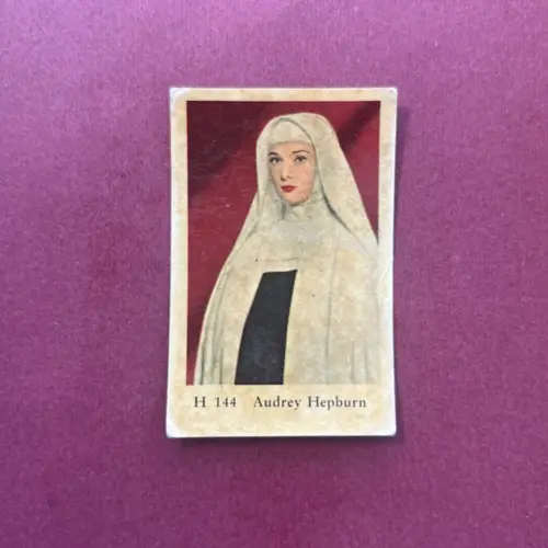 Audrey Hepburn — 1961 H #144